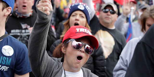 Supporters of President Donald Trump attend a rally at Freedom Plaza, Saturday, Dec. 12, 2020, in Washington. (Associated Press)