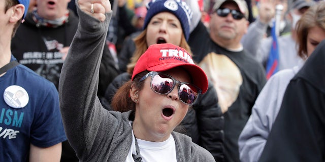 Supporters of President Donald Trump attend a rally at Freedom Plaza, Saturday, Dec. 12, 2020, in Washington. (Associated Press)