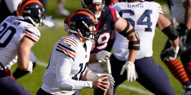 Chicago Bears quarterback Mitchell Trubisky (10) looks to throw during the first half of an NFL football game against the Houston Texans, Sunday, Dec. 13, 2020, in Chicago. (AP Photo/Nam Y. Huh)
