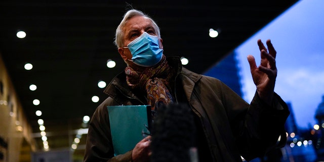 European Commission's Head of Task Force for Relations with the United Kingdom Michel Barnier talks to the media outside the EU headquarters in Brussels, Monday, Dec. 14, 2020. Teetering on the brink of a no-deal Brexit departure, Britain and the European Union stepped back from the void Sunday and agreed to continue trade talks, although both downplayed the chances of success. (AP Photo/Francisco Seco)