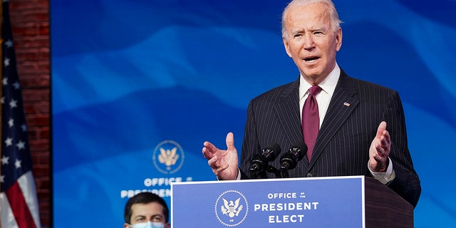 President-elect Joe Biden speaks as he announces former South Bend, Ind. Mayor Pete Buttigieg as his nominee for transportation secretary during a news conference at The Queen theater in Wilmington, Del., Wednesday, Dec. 16, 2020. (Kevin Lamarque/Pool via AP)