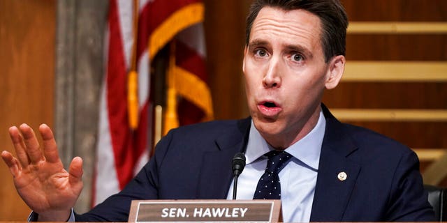 Sen. Josh Hawley, R-Mo., asks questions during a Senate Homeland Security &amp; Governmental Affairs Committee hearing to discuss election security and the 2020 election process on Wednesday, Dec. 16, 2020, on Capitol Hill in Washington. Hawley said Wednesday he will object to the certification of Electoral College votes on Jan. 6. (Greg Nash/Pool via AP)