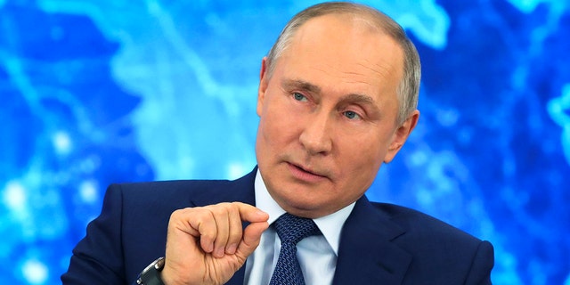 Russian President Vladimir Putin speaks via video call during a news conference in Moscow, Russia, Thursday, Dec. 17, 2020. This year, Putin attended his annual news conference online due to the coronavirus pandemic. (Mikhail Klimentyev, Sputnik, Kremlin Pool Photo via AP)