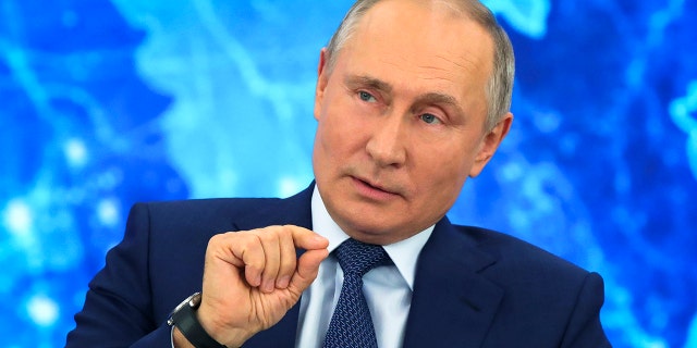 Russian President Vladimir Putin speaks via video call during a news conference in Moscow, Russia, Thursday, Dec. 17, 2020. This year, Putin attended his annual news conference online due to the coronavirus pandemic. (Mikhail Klimentyev, Sputnik, Kremlin Pool Photo via AP)