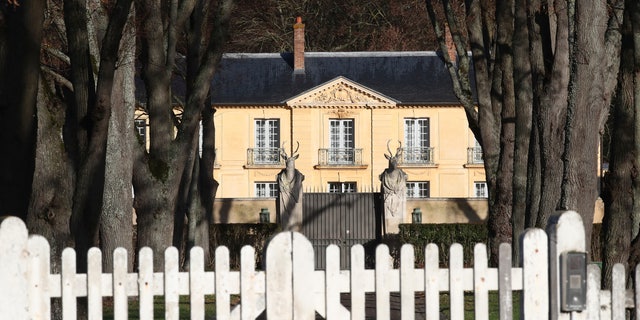 La Lanterne, a presidential residence in Versailles, outside Paris, is pictured Friday, Dec. 18, 2020 in Paris. As French President Emmanuel Macron rides out the coronavirus in a presidential retreat at Versailles, French doctors are warning families who are heading for the holidays to remain cautious because of an uptick in infections — especially at the dinner table. (AP Photo/Michel Euler)