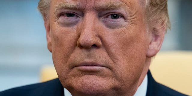 In this Jan. 27, 2020, file photo President Trump listens during a meeting with Israeli Prime Minister Benjamin Netanyahu in the Oval Office of the White House in Washington. (AP Photo/ Evan Vucci)