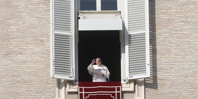 Pope Francis delivers the Angelus noon prayer in St. Peter's Square at the Vatican, Sunday, Dec. 20, 2020. (AP Photo/Gregorio Borgia)