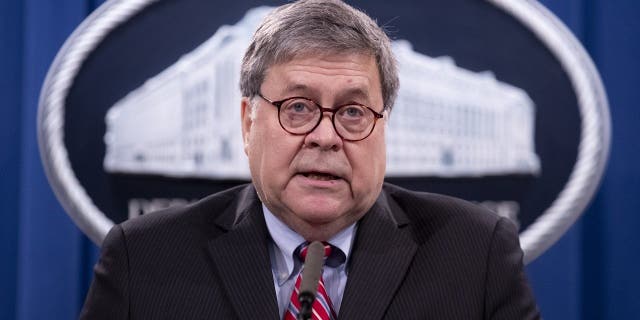 Attorney General William Barr speaks during a news conference, Monday, Dec. 21, 2020 at the Justice Department in Washington.