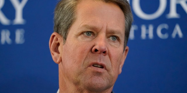 Georgia Gov. Brian Kemp speaks during a news conference on vaccines for COVID-19 at Emory Health Care Tuesday, Dec. 22, 2020, in Atlanta. (AP Photo/John Bazemore)