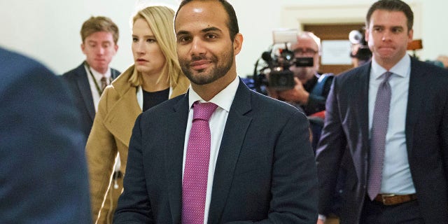 FILE - In this Oct. 25, 2018, file photo, George Papadopoulos, the former Trump campaign adviser who triggered the Russia investigation, arrives for his first appearance before congressional investigators, on Capitol Hill in Washington. On Tuesday, Dec. 22, 2020, President Donald Trump pardoned 15 people, including Papadopoulos, his 2016 former campaign adviser whose conversation unwittingly helped trigger the Russia investigation that shadowed Trump’s presidency for nearly two years. (AP Photo/Carolyn Kaster, File)