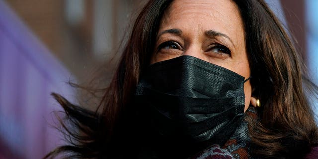 Vice President-elect Kamala Harris, accompanied by her husband Doug Emhoff, talks to the media after dropping off Toys for Tots items at a District of Columbia Fire House, Tuesday, Dec. 22, 2020, in Washington.