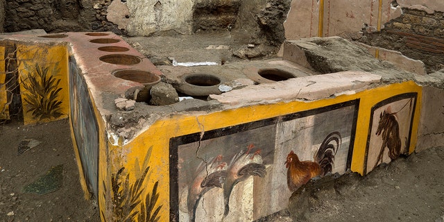 An undated photo made available by the Pompeii Archeological park press office shows the thermopolium in the Pompeii archeological park, near Naples, Italy. (Luigi Spina/Parco Archeologico di Pompei via AP)Pompeii dig uncovers secrets-unearthed fast-food restaurant, learn more from unbiased, non political news, follow News Without Politics, archaeology, world news,