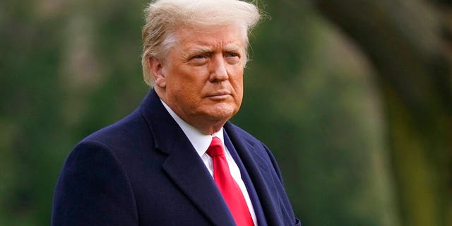 FILE: President Donald Trump walks on the South Lawn of the White House in Washington before boarding Marine One.
