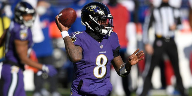 Baltimore Ravens quarterback Lamar Jackson looks to throw a pass against the New York Giants during the first half of an NFL football game, Sunday, Dec. 27, 2020, in Baltimore. (AP Photo/Nick Wass)