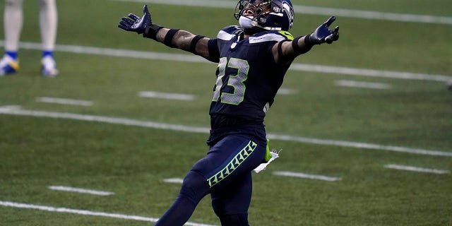 Seattle Seahawks strong safety Jamal Adams (33) reacts to a play against the Los Angeles Rams during the second half of an NFL football game, Sunday, Dec. 27, 2020, in Seattle. The Seahawks won 20-9. (AP Photo/Elaine Thompson)