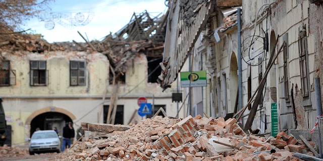 A view of buildings damaged in an earthquake in Petrinja, Croatia, Tuesday, Dec. 29, 2020. A strong earthquake has hit central Croatia and caused major damage and at least one death and some 20 injuries in the town southeast of the capital Zagreb. (AP Photo)