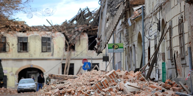 A view of buildings damaged in an earthquake in Petrinja, Croatia, Tuesday, Dec. 29, 2020. A strong earthquake has hit central Croatia and caused major damage and at least one death and some 20 injuries in the town southeast of the capital Zagreb. (AP Photo)