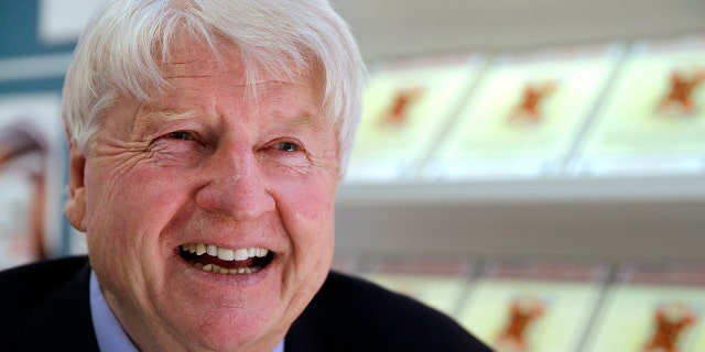 In this Thursday, March 16, 2017, file photo, Stanley Johnson poses for a portrait as he talks to the Associated Press at the London Book Fair, in London, about his forthcoming thriller based around a fictitious Brexit scenario. (AP Photo/Alastair Grant, File)