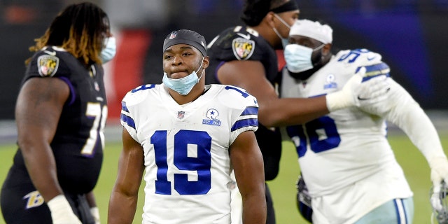 Dallas Cowboys wide receiver Amari Cooper (19) leaves the field after an NFL football game against the Baltimore Ravens, Tuesday, Dec. 8, 2020, in Baltimore. The Ravens won 34-17. (AP Photo/Gail Burton)