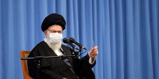 Iranian Supreme Leader Ayatollah Ali Khamenei speaks in a meeting with the family of Revolutionary Guard Gen. Qassem Soleimani, who was killed in a U.S. drone strike in Baghdad in early 2020, and top military leaders, in Tehran, Iran, on Wednesday. (Office of the Iranian Supreme Leader/AP)