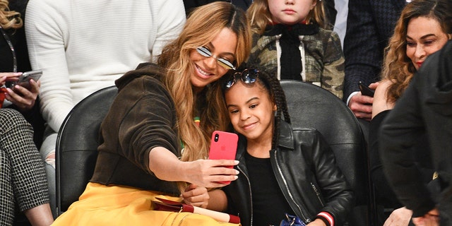 Beyonce and Blue Ivy Carter attend the 67th NBA All-Star Game at Staples Center Feb. 18, 2018, in Los Angeles.  