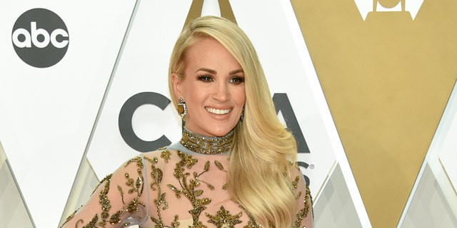 American Idol champion Carrie Underwood said she was reconnecting with her “roots”.  (Photo by John Shearer / WireImage,)