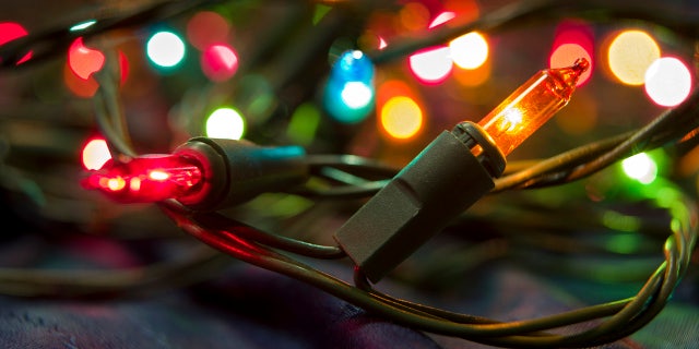 Experts and social-media influencers claim there are benefits to hanging your lights vertically, rather than coiling them around the tree.