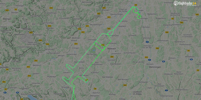 A pilot in Germany traced a giant syringe in the air.