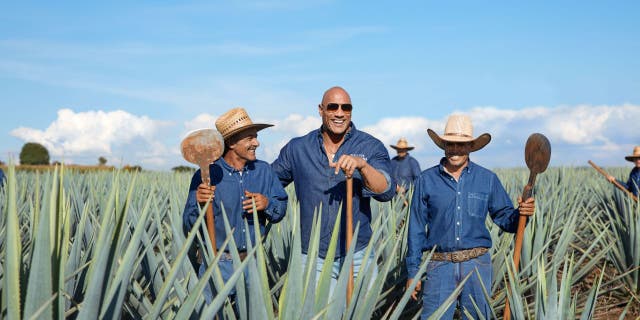 Dwayne "The Rock" Johnson cofounded Teremana Tequila alongside his business partners Dany Garcia, Ken Austin and Jenna Fagnan (not pictured) in 2020. Agave spirits are the hottest sector of the American spirits market in 2022, according to IWSR Drinks Market Analysis.