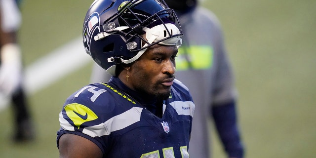 Seattle Seahawks wide receiver DK Metcalf walks off the field after an NFL football game against the New York Giants, Sunday, Dec. 6, 2020, in Seattle. The Giants won 17-12. (AP Photo/Elaine Thompson)