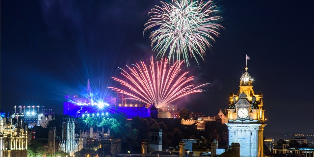 Edinburgh, Scotland - August 15, 2017: The scenic summer fireworks in Edinburgh during the Royal Military Tattoo and Fringe Festival.