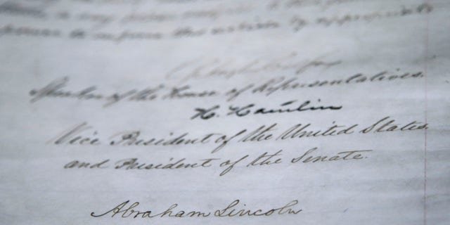 President Abraham Lincoln's signature is seen on the 13th Amendment in a display at the Tennessee State Museum on Feb. 11, 2013, in Nashville, Tenn. The 13th Amendment, which abolished slavery, was on display along with the Emancipation Proclamation as part of a Discovering the Civil War exhibit.