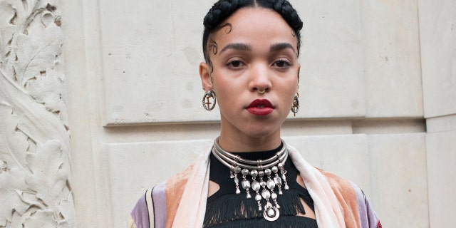 Singer FKA Twigs recounted a trip she took with LaBeouf where he allegedly threw her against a car and threatened to crash if she said she didn't love him. (Photo by Kirstin Sinclair/Getty Images)