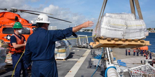 Florida fishermen discover 74 kilos of cocaine floating off Florida Keys 2 The Coast Guard Cutter James (WMSL 754) crew directs a crane operator from the flight deck offloading approximately 23,000 pounds of cocaine and 8,800 pounds of marijuana at Port Everglades, Florida, Dec. 16, 2020. The James crew patrolled the Eastern Pacific Ocean in support of enhanced counter-narcotics operations in the Western Hemisphere to disrupt transnational crime organizations. (U.S. Coast Guard photo by Petty Officer 3rd Class Jose Hernandez)