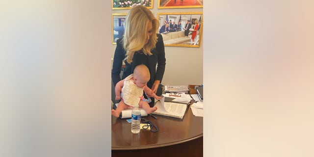 McEnany and her daughter, Blake, in her office at the White House.