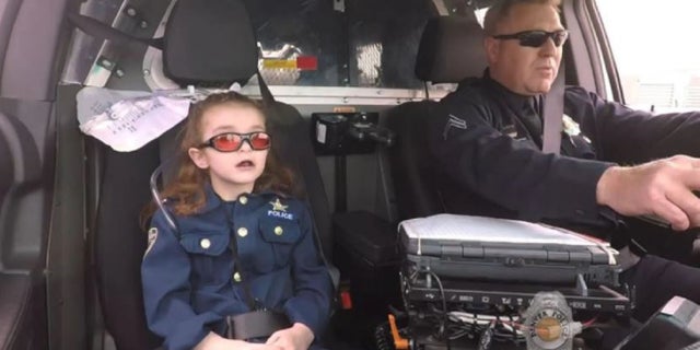 Media coverage showed 7-year-old Olivia Gant fulfilling a bucket list that included being a cop for a day.