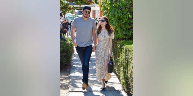 Garrett Hedlund  (L) and Emma Roberts (R) are seen on August 10, 2019 in Los Angeles, California.