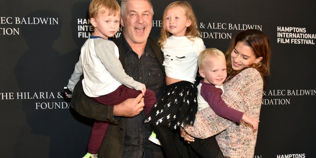 Alec Baldwin (2nd L) Hilaria Baldwin (R) and three of their children.