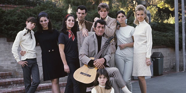 Entertainer Dean Martin with his wife Jeanne and children (Gail, Craig, Claudia, Deana, Gina, Ricci and Dean Paul), circa 1966.
