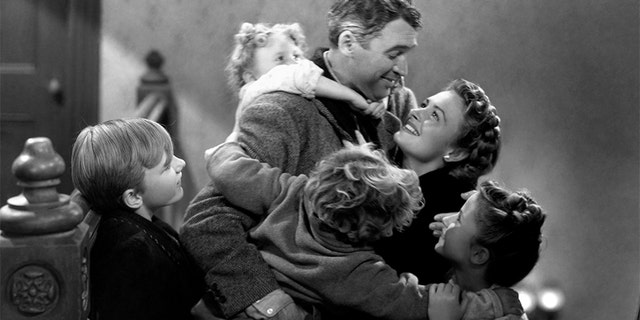 Clockwise from top: James Stewart, Donna Reed, Carol Coombs, Jimmy Hawkins, Larry Simms and Karolyn Grimes.