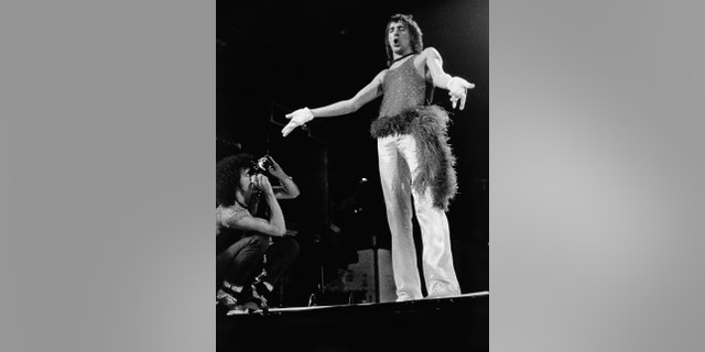 Bob Gruen photographs Rod Stewart while he performs at Boston Garden in May 1973.
