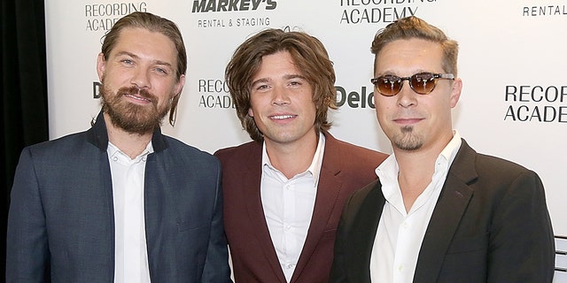 Taylor Hanson (center) and his brothers Zac (left) and Isaac (right) are part of the band Hanson. (Photo by Gary Miller/FilmMagic)
