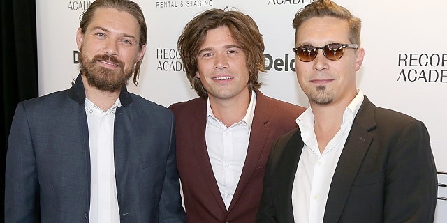 Taylor Hanson (center) and his brothers Zac (left) and Isaac (right) are part of the Hanson Orchestra.  (Photo by Gary Miller / FilmMagic)