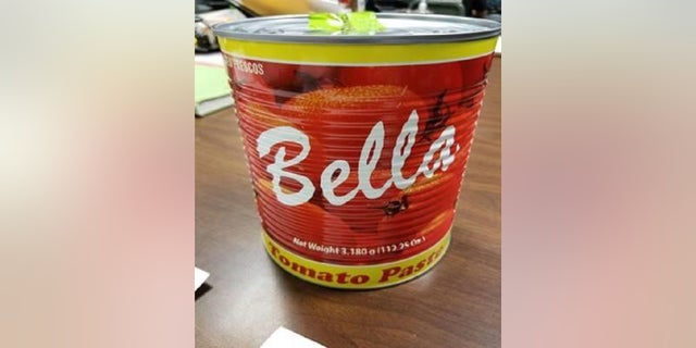 A traveler was caught with cocaine inside a can of tomato paste in a New York City airport, authorities said. 
