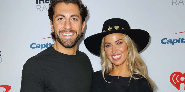 Jason Tartick (left) and Kaitlyn Bristowe (right) say they have contracted coronavirus after having a visitor in their home. (Photo by JC Olivera/Getty Images)