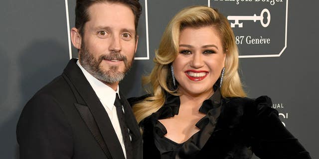 Kelly Clarkson (right) filed for divorce from Brandon Blackstock (left) in June.