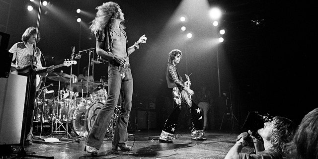 Bassist John Paul Jones, singer Robert Plant and guitarist Jimmy Page seen performing with Led Zeppelin in the 1970s.
