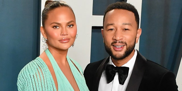 Chrissy Teigen (left) and her husband, singer John Legend (right), share two children: Luna 4, and Miles, 2. She suffered a loss of pregnancy in the fall. (Photo by Allen Berezovsky/Getty Images)