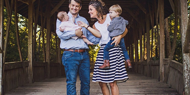 The late Luke Letlow is seen with Julia Letlow and their children in an undated photo.