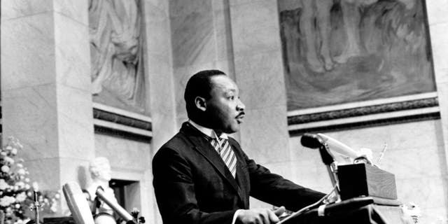 Dr. Martin Luther King Jr. delivers his Nobel Peace Prize acceptance speech in the auditorium of Oslo University in Norway on Dec. 10, 1964. (AP Photo)